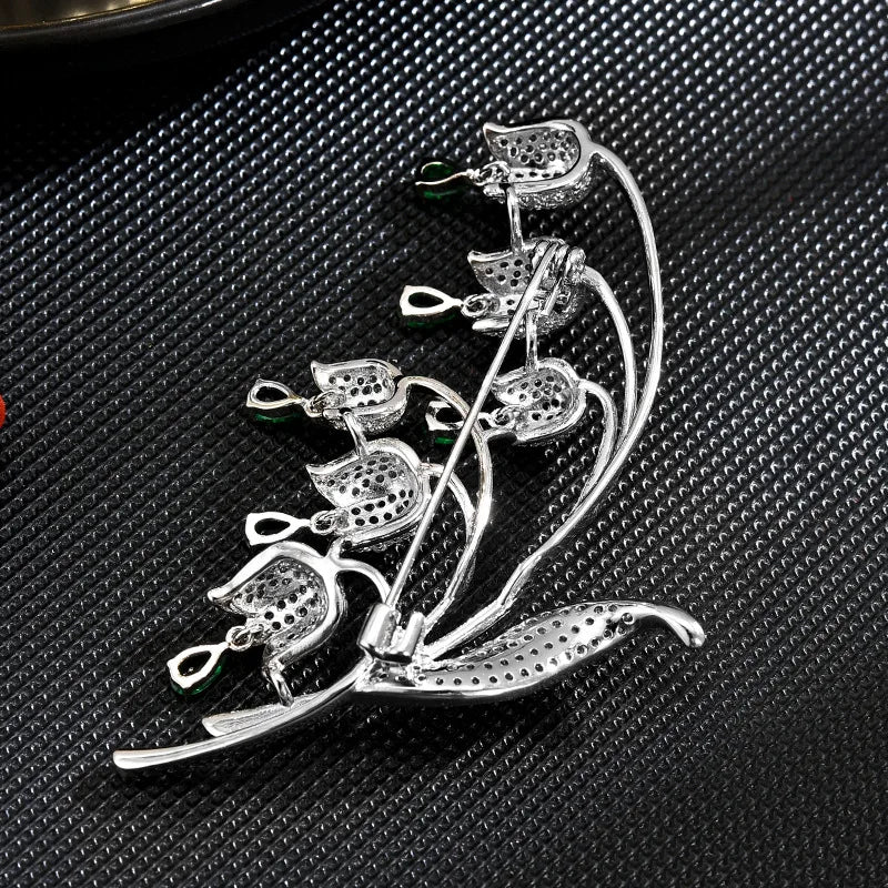 Autumn New Korean Elegant and Fashionable Clock Orchid brooch Creative Personalized Flower Clothing Pin Accessories for Women