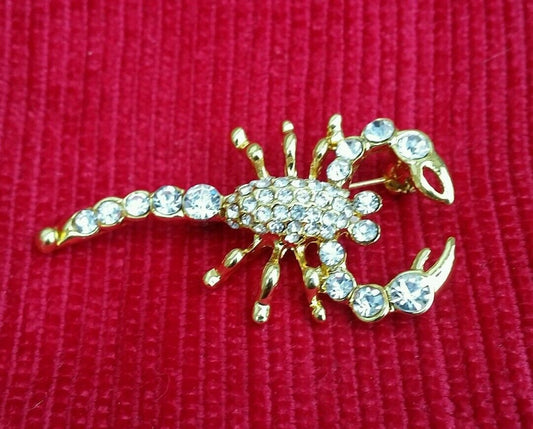 Gold plated scorpion brooch star sign cake pin - birth sign talisman protection