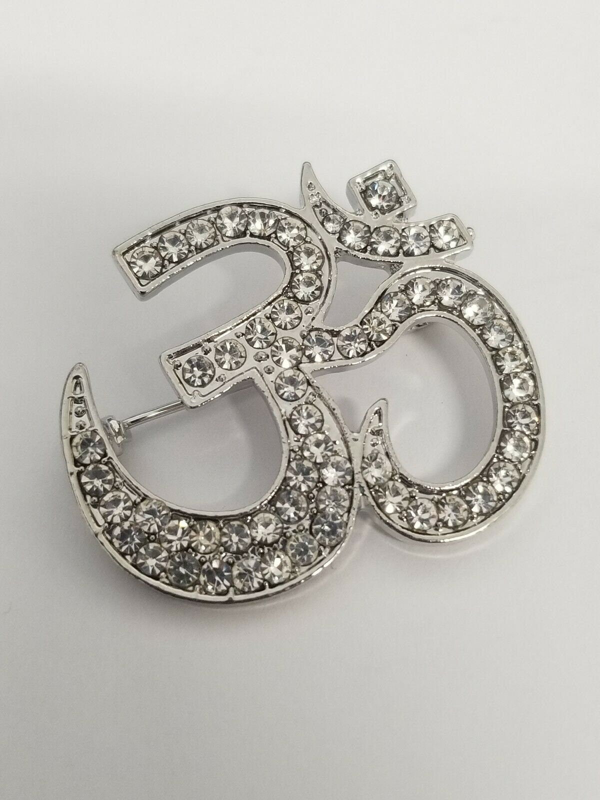 Stunning diamonte silver plated om hindu religious brooch cake broach pin gift